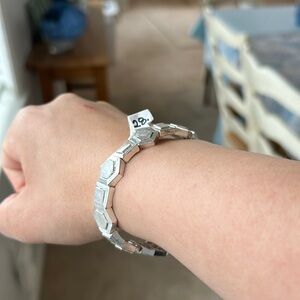 never worn, silver stretchy bracelet